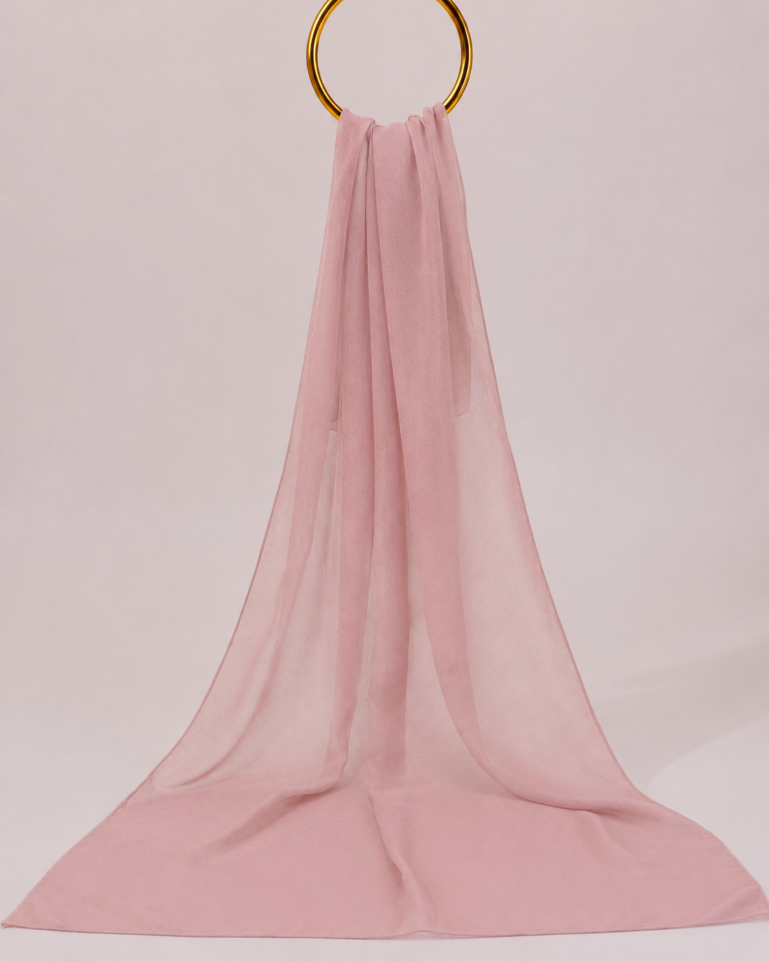 Plain dusty rose pink nida hijab draped elegantly