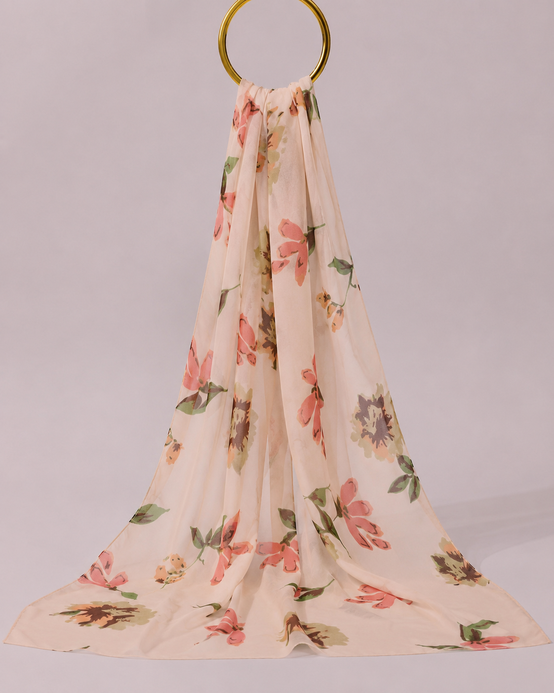 Floral chiffon hijab in peach draped elegantly