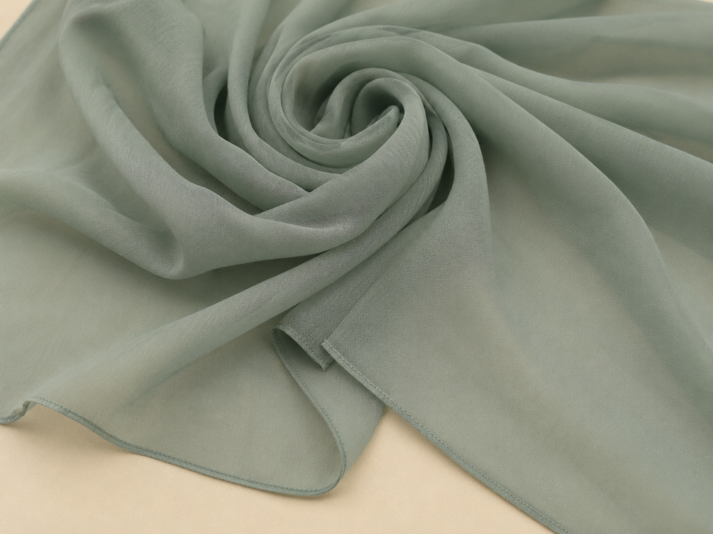 Sage green nida fabric close-up texture