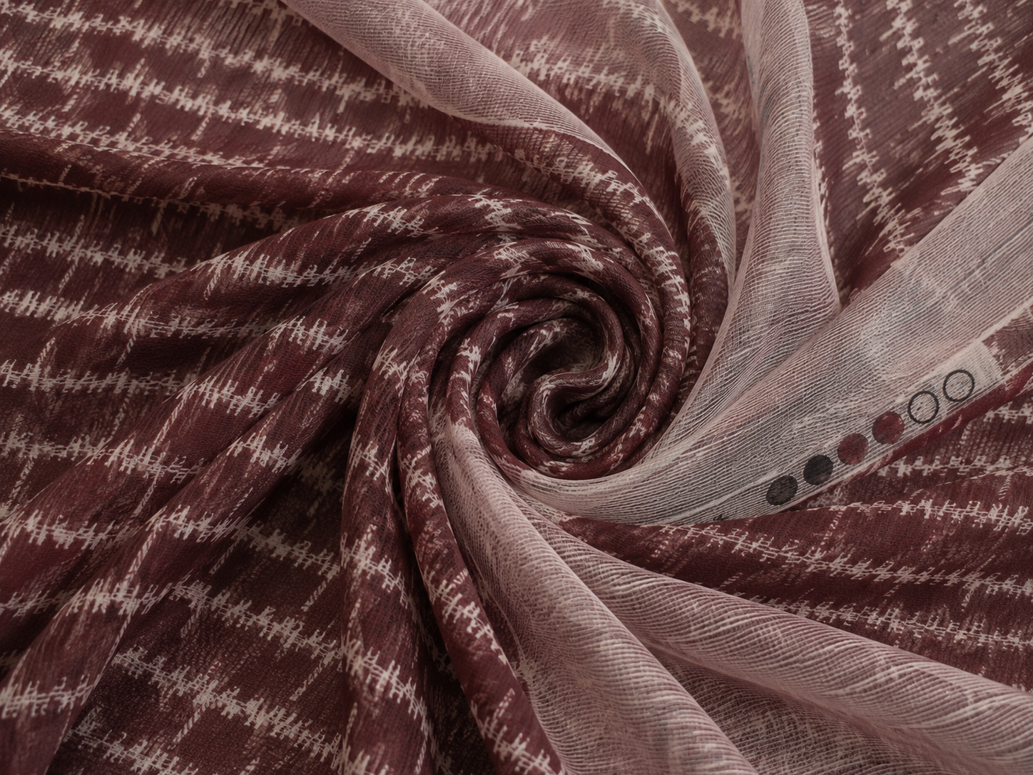 Burgundy chiffon fabric close-up woven texture
