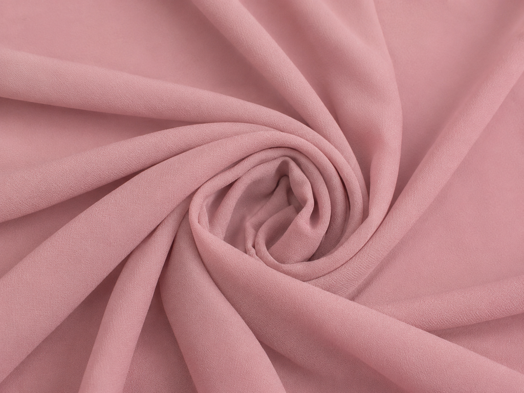 Dusty rose pink nida fabric close-up texture