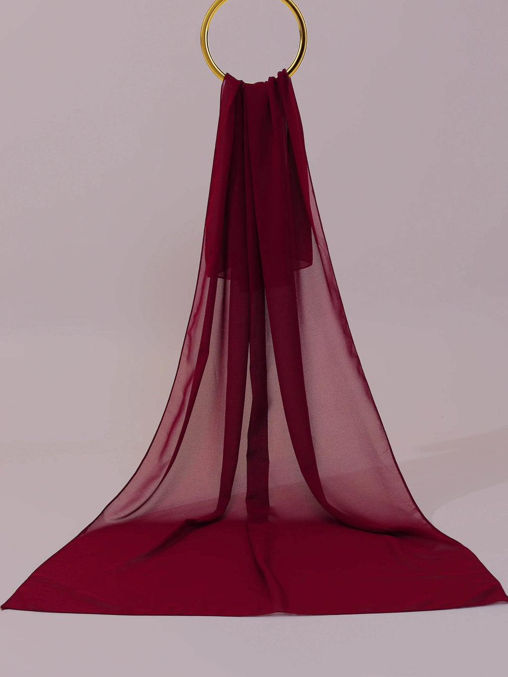Deep maroon georgette fabric close-up texture