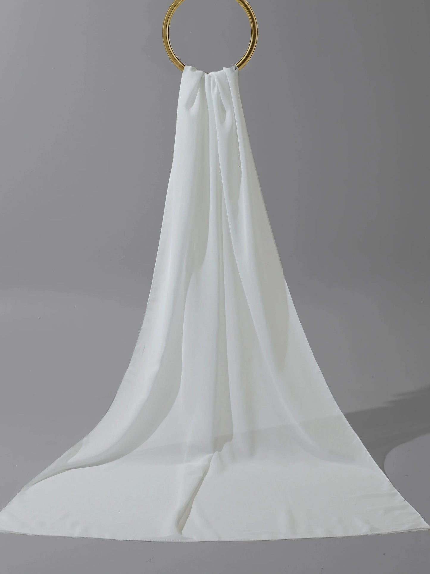 Plain white nida hijab draped elegantly